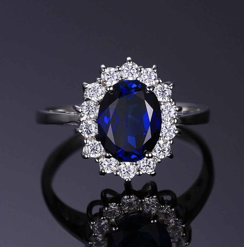 KateSterlingSilverCzBirthstoneEngagementRingWomenGingerLyneCollection_Blue-2