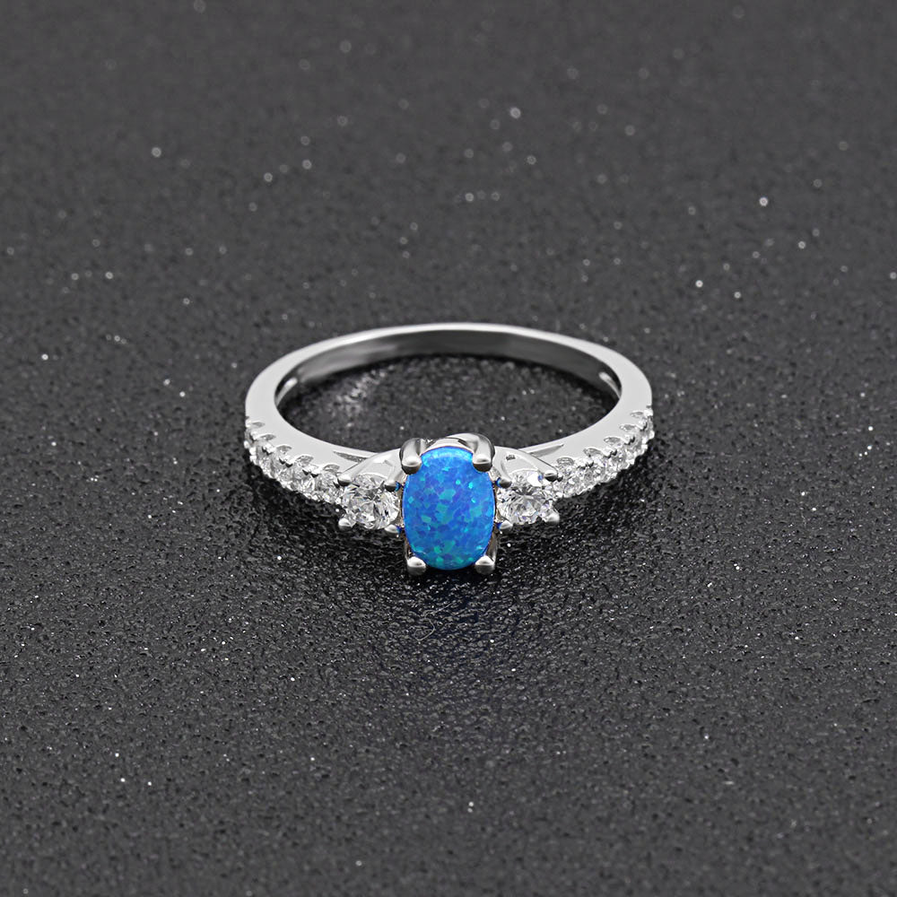 EmilyFireOpalSterlingSilverCzEngagementRingWomensGingerLyneCollection_Blue-4