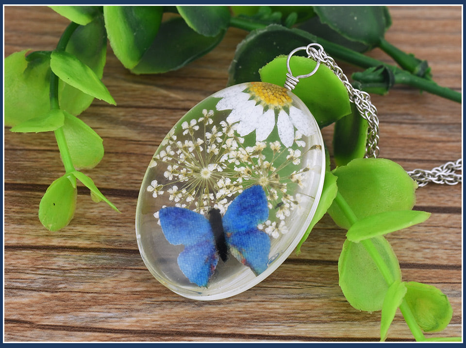 DriedFlowerOvalClearButterflyPendantNecklaceWomenGingerLyneCollection_blue-3