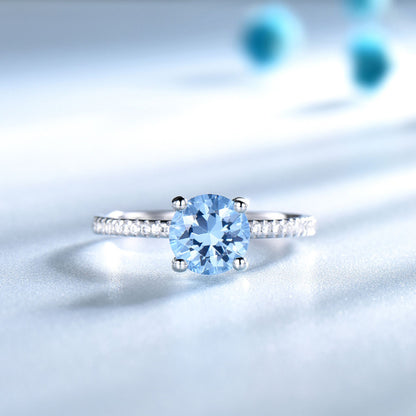BlueTopazEngagementforWomenRingSterlingSilverGingerLyneCollection_Blue-3