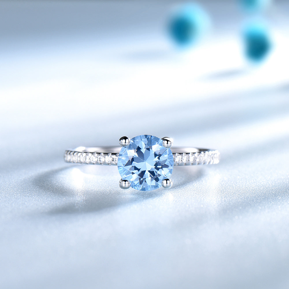 BlueTopazEngagementRingforWomenSterlingSilverGingerLyneCollection_Blue-3