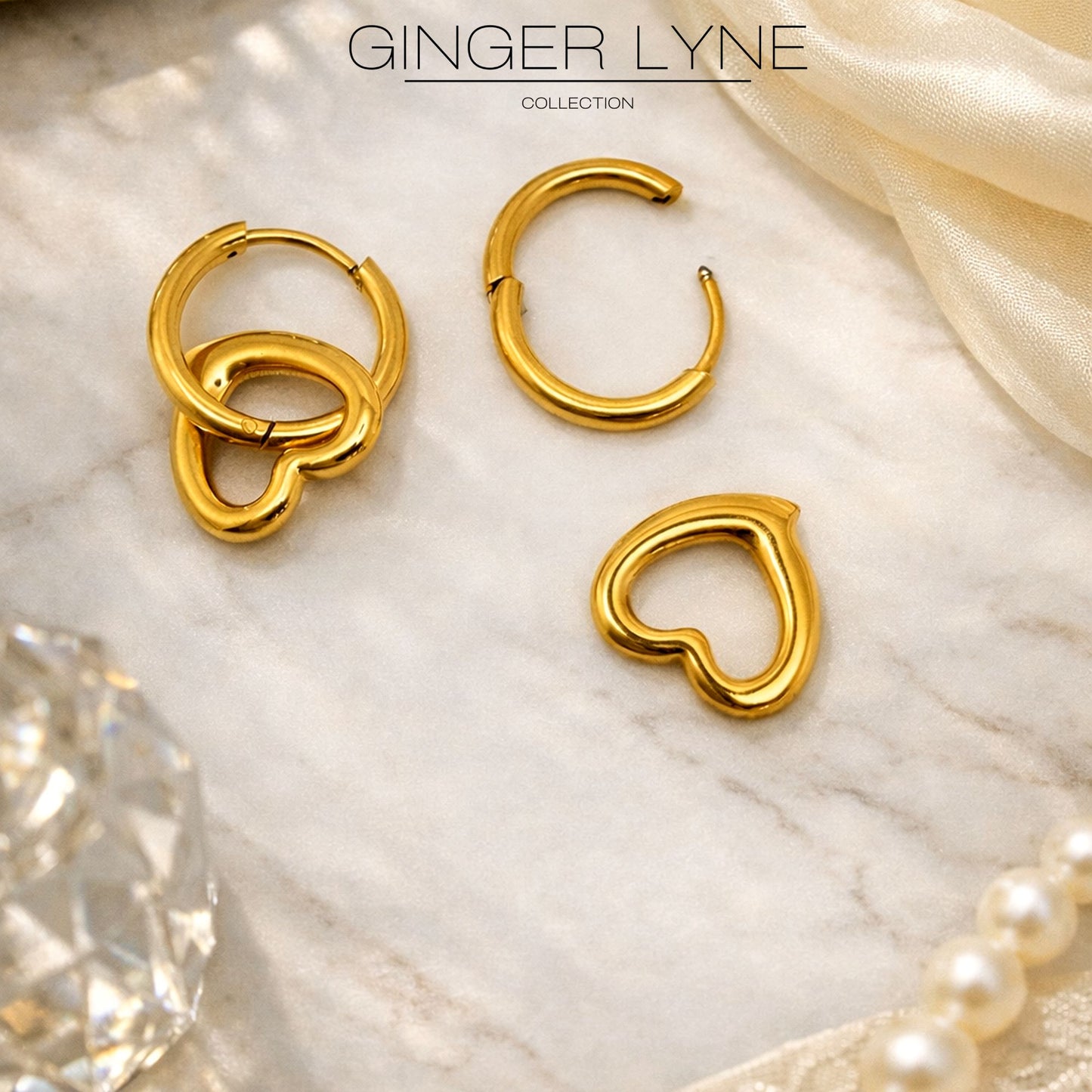 OpenHeartCharmDangleHuggieHoopEarringsStainlessSteelbyGingerLyne_Gold-3