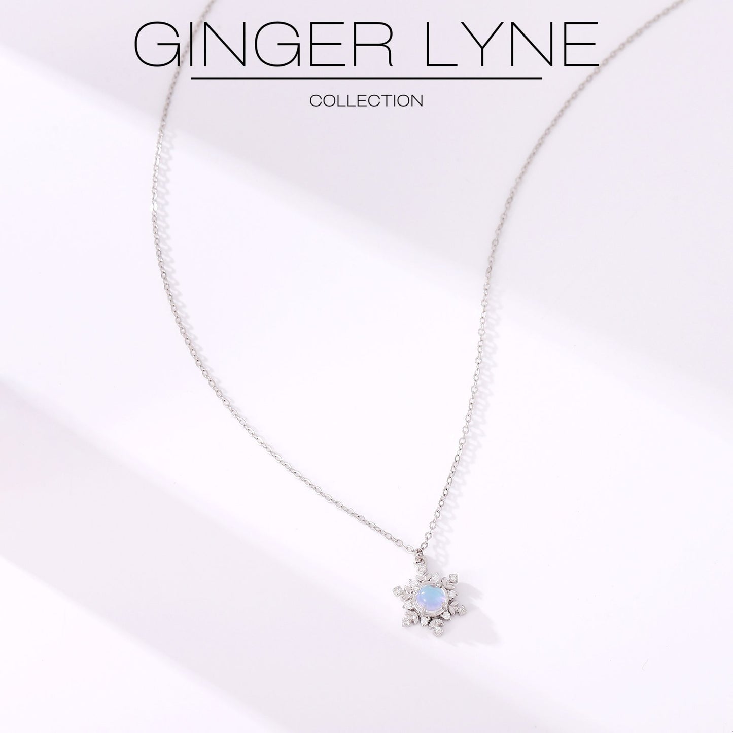 SnowflakeNecklaceforWomenbyGingerLyneSimulatedMoonstoneCZSterlingSilverChristmasJewelryGift_Silver-3