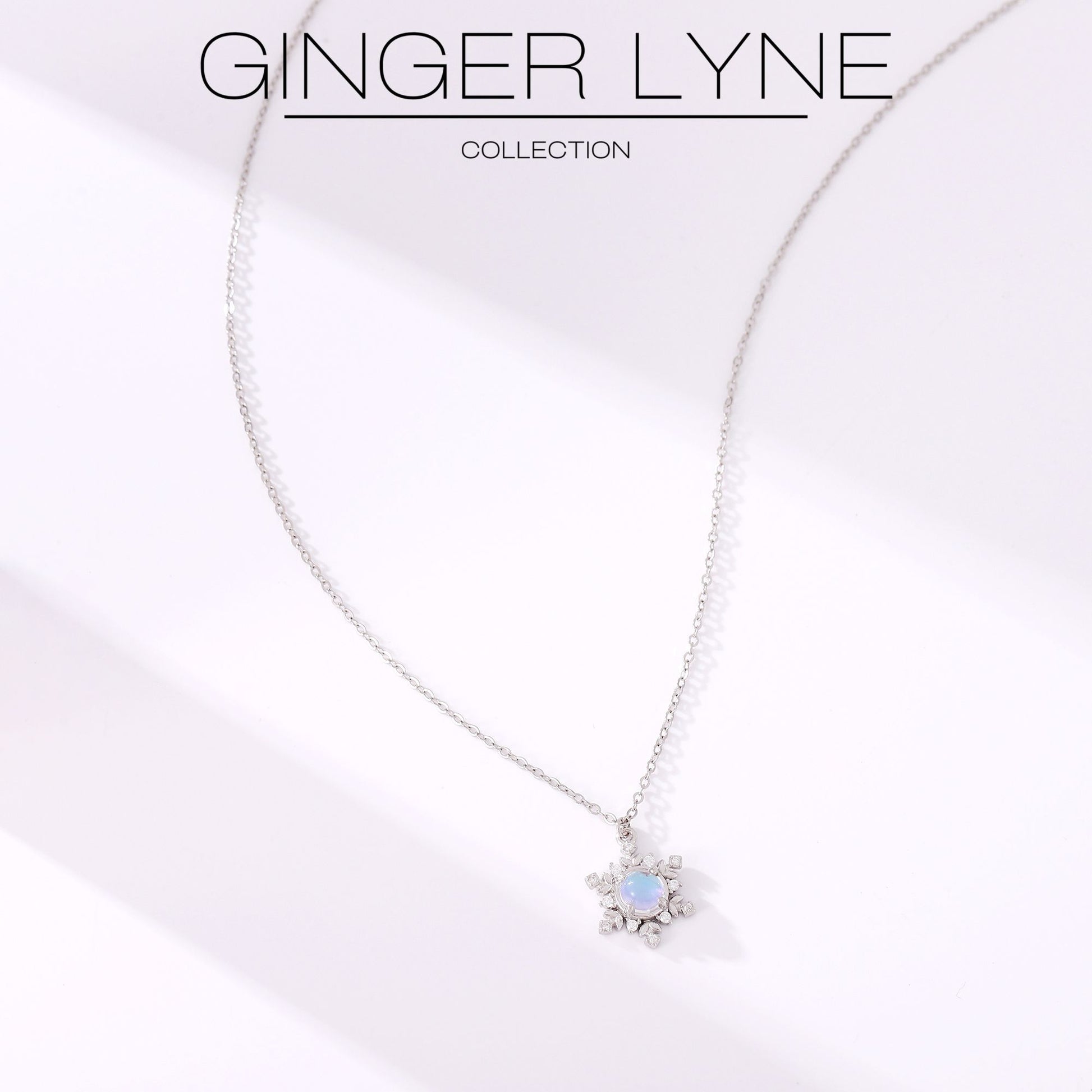 SnowflakeNecklaceforWomenbyGingerLyneSimulatedMoonstoneCZSterlingSilverChristmasJewelryGift_Silver-3
