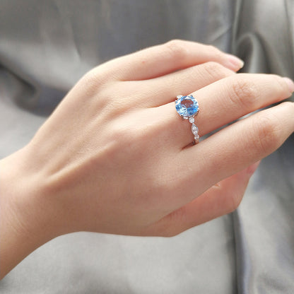 BlueTopazEngagementforWomenRingSterlingSilverGingerLyneCollection_Blue-5