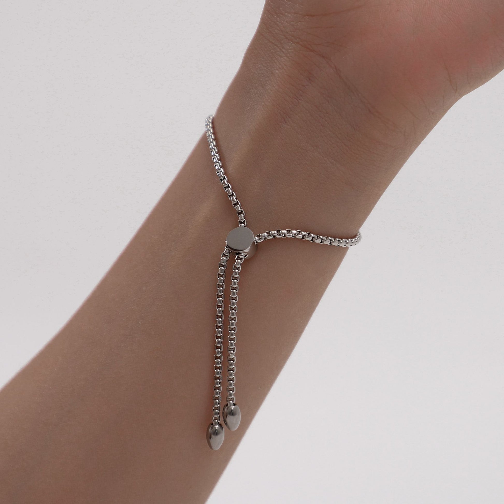 Religious Cross Bracelet by Ginger Lyne Adjustable Stainless Steel Chain Silver or Gold Finish - Silver