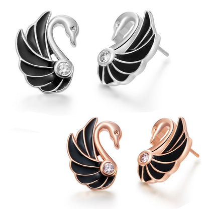 Silver Tone Swan Stud Earrings for Women with Blue Cubic Zirconia Small Bird Studs by Ginger Lyne - Silver