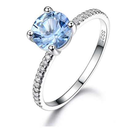 BlueTopazEngagementforWomenRingSterlingSilverGingerLyneCollection_Blue-1