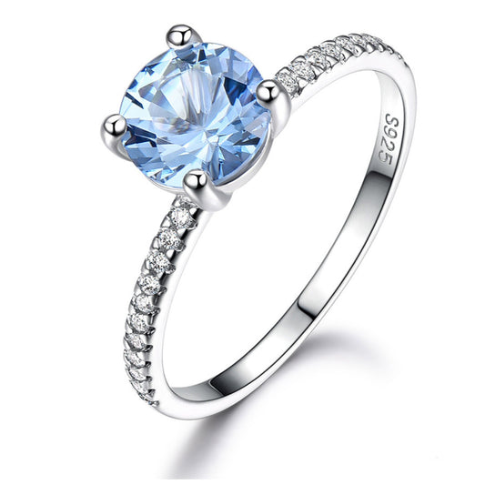 BlueTopazEngagementforWomenRingSterlingSilverGingerLyneCollection_Blue-1