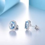 Load image into Gallery viewer, Oval Halo Stud Earrings for Women Blue Topaz Sterling Silver Ginger Lyne Collection
