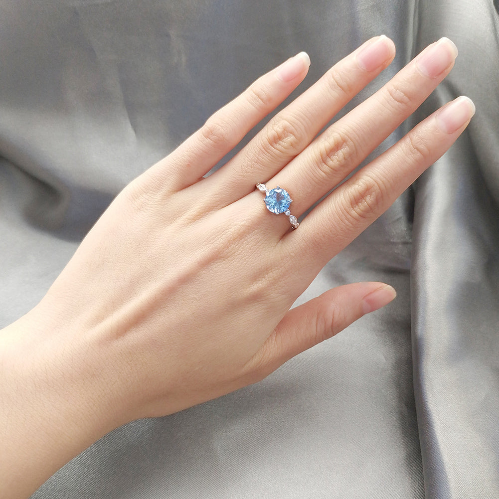 BlueTopazEngagementforWomenRingSterlingSilverGingerLyneCollection_Blue-6